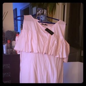 Pink shirt with cold shoulders.